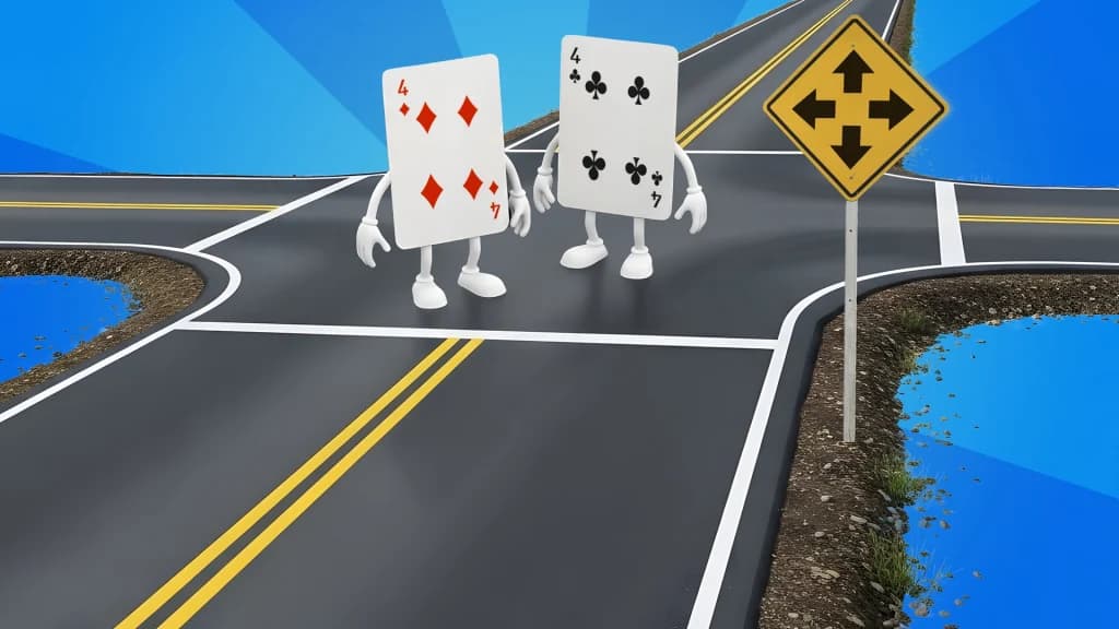 Two 4 playing cards stand at a four-way crossroads on a highway. 