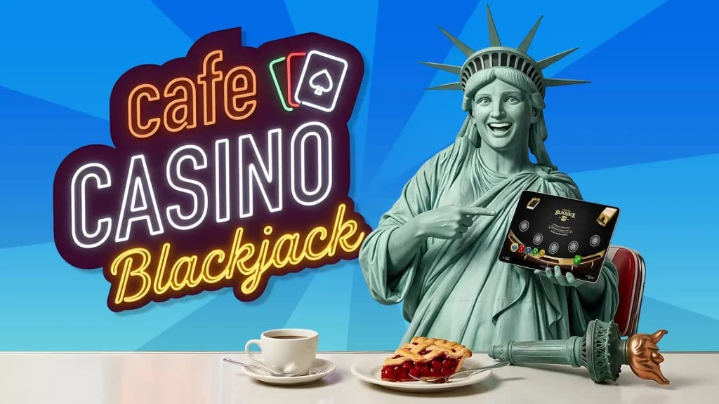 The Cafe Casino Blackjack logo is lit in neon lights to the left of the Statue of Liberty, who is smiling and holding an iPad, playing blackjack, with coffee and pie below her. 