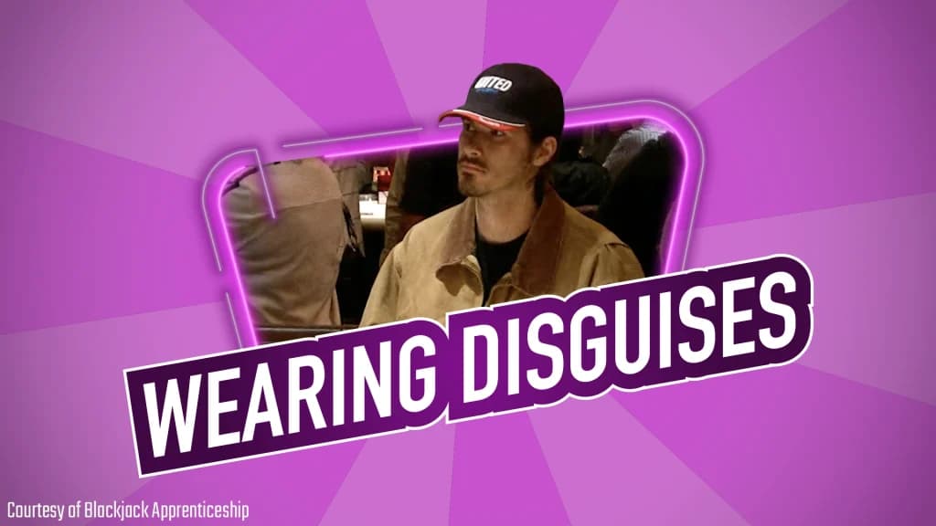 Colin Jones in disguise at a casino blackjack table, wearing a cap pulled low over his face.