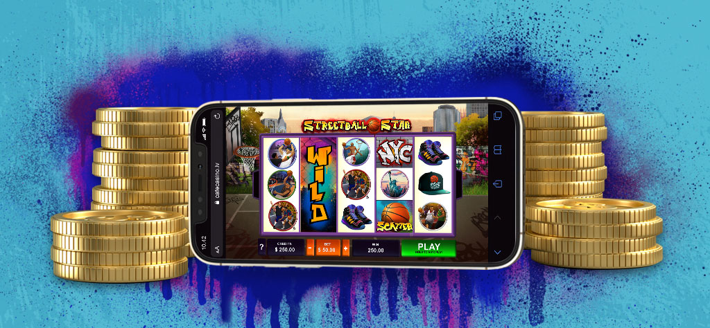 Cafe Casino’s Streetball Star slot displayed on a mobile phone, with stacks of gold coins on each side, in front of a blue background with purple spray paint