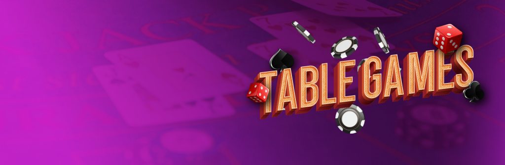 Table Games written in Vegas style letters in front of Blackjack chips, with a red dice in the middle of the words