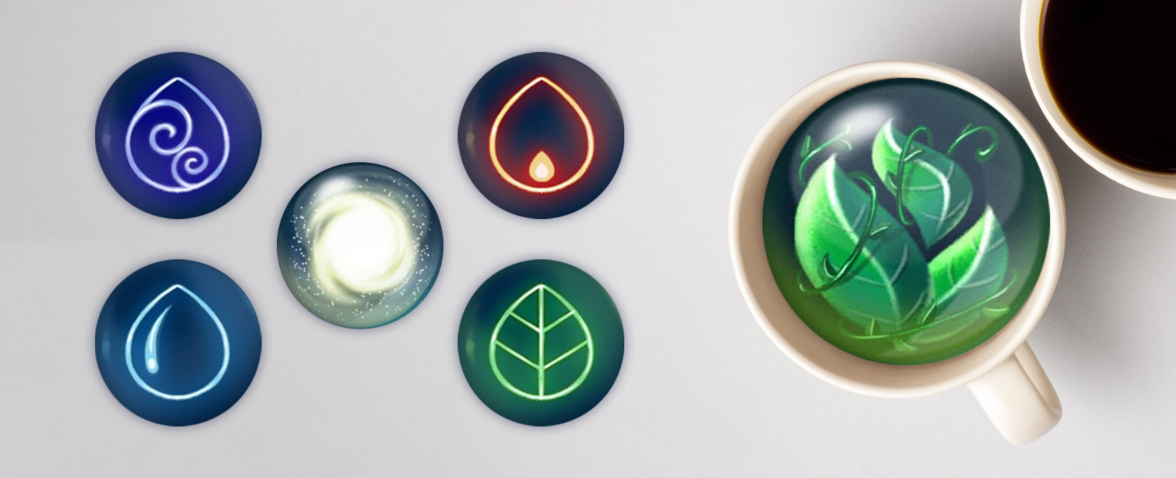 Four illustrated symbols – earth, air, fire, and water – appear within circles on top of a white table surface, surrounding another circle depicting the galaxy. To the right, a white coffee cup is filled with illustrated green leaves, and slightly appearing in the top right corner of the screen is another coffee cup filled with black coffee.