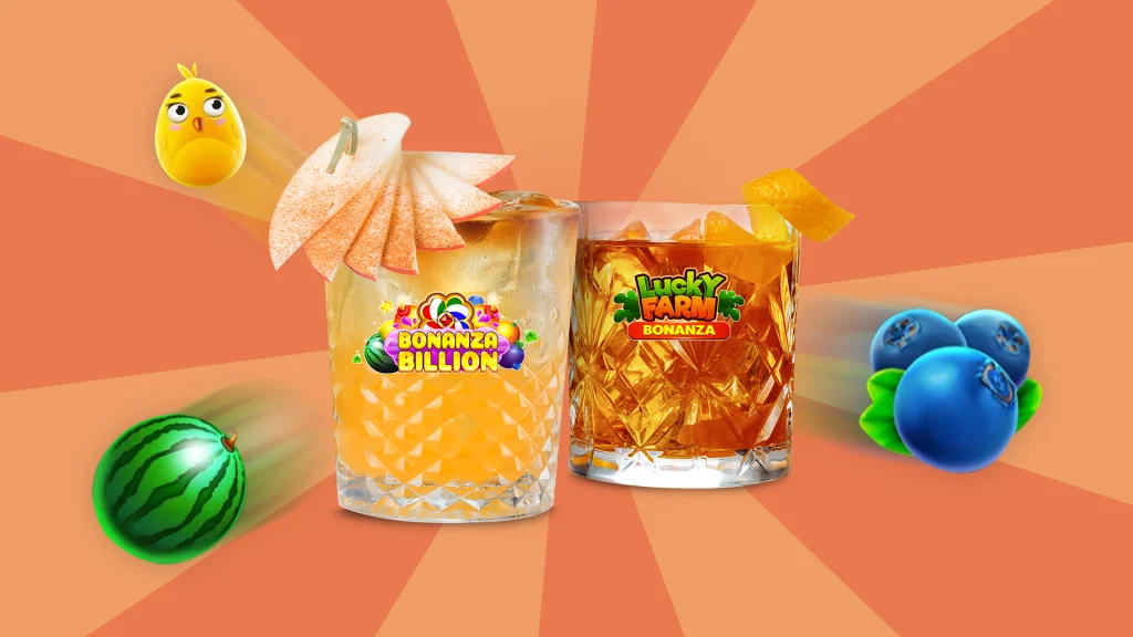 Two cocktails flanked by fruits, with Cafe Casino slot games logos on the glass, are set against an orange background.