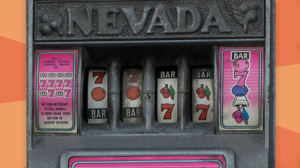 Vintage slot machine featuring fruit symbols, on an orange background.