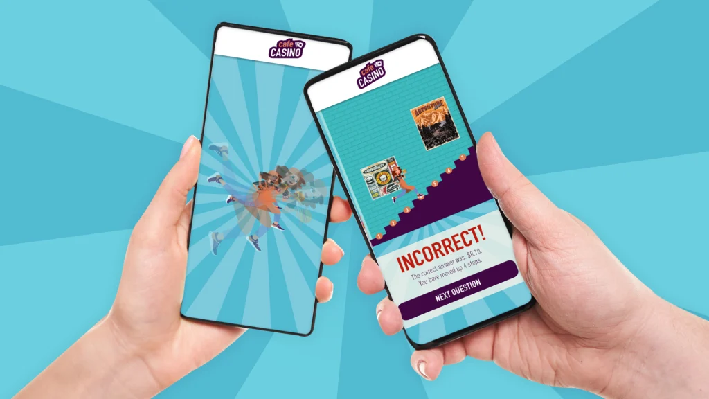 Two hands hold up mobile phones showing free to play mini games from Cafe Casino, against a blue background.