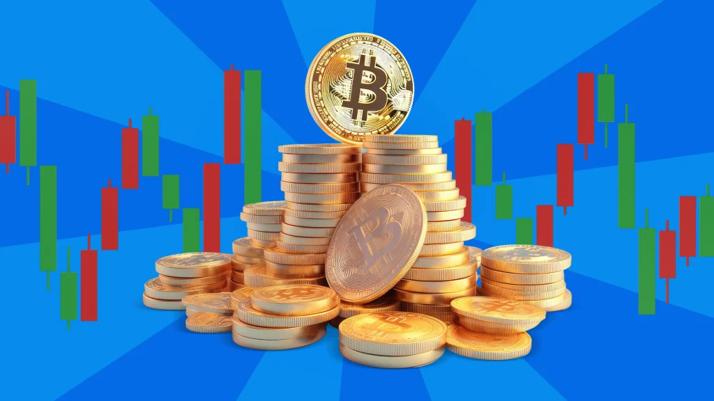A blue background with stacks of gold Bitcoin coins and one standing and facing the front with a ‘B’.