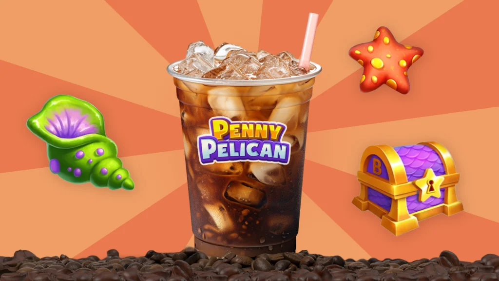 A shell, a treasure chest, and a starfish surround a peach background with a big iced coffee that says “Penny Pelican”, and the cup is standing on a pile of roasted coffee beans.