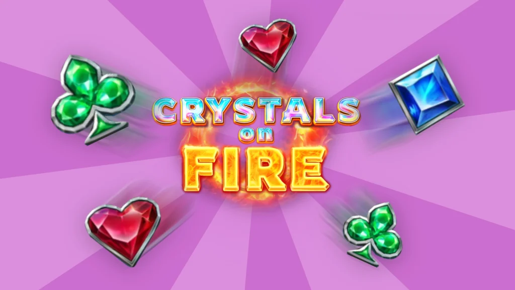 There’s a light purple background and the text ‘Crystals on Fire’ in the center of a burning ring of fire. Slot jewel symbols surround it on all sides.