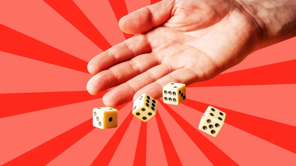 a hand throws 4 dice on a red background